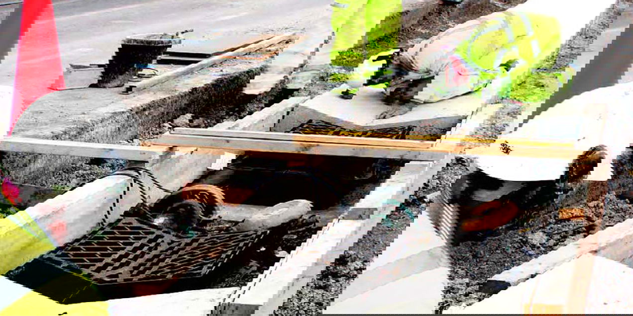 V Gully Grate being installed in motorway