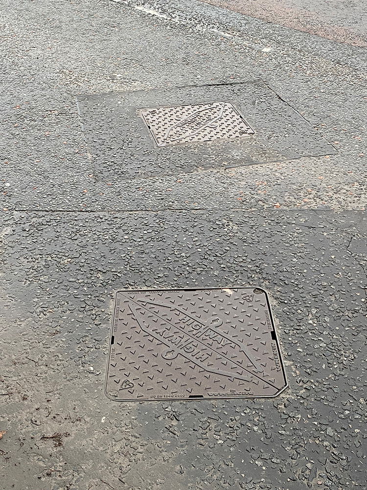 Highway manhole cover installed in a road