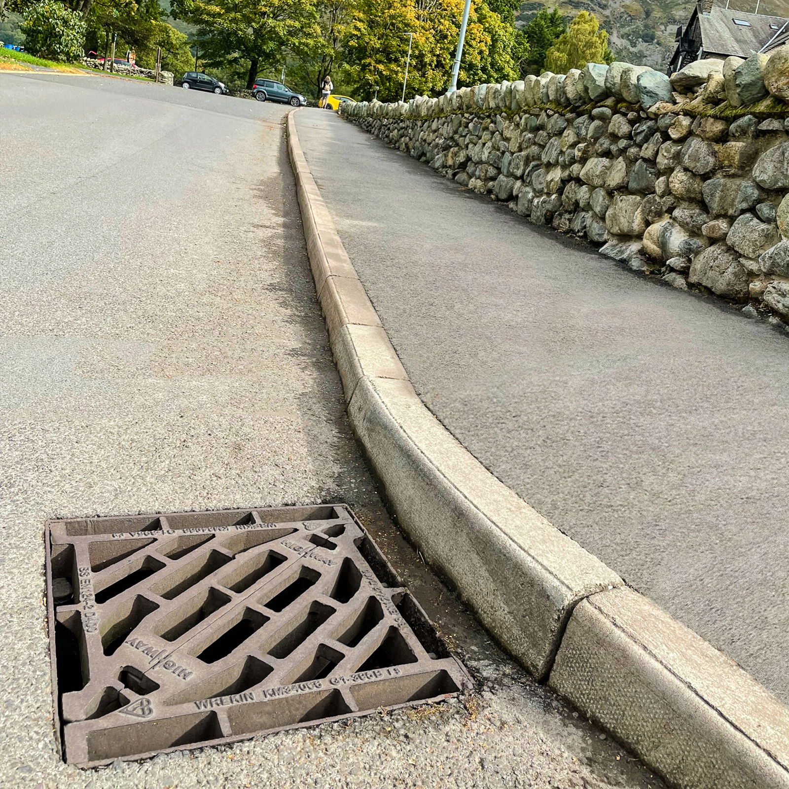 A Highway gully grate in the road
