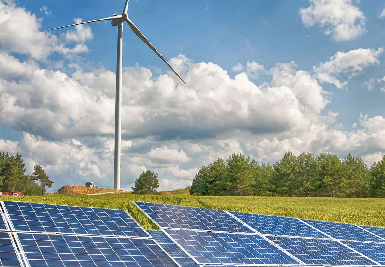 Sustainability - a windmill and solar panels