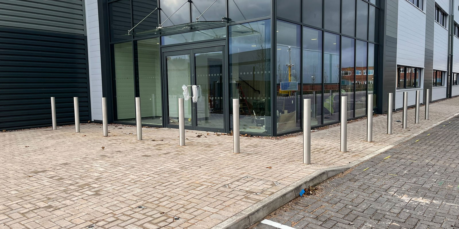 Bespoke steel bollards installed outside office building