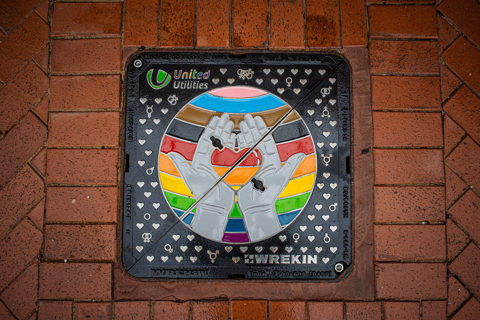 United Utilities logo visible on a bespoke manhole cover manufactured by Wrekin Products