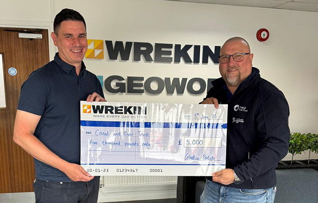 Ricky Hasprey presents the cheque to Terry Hodgetts of Canal and River Trust