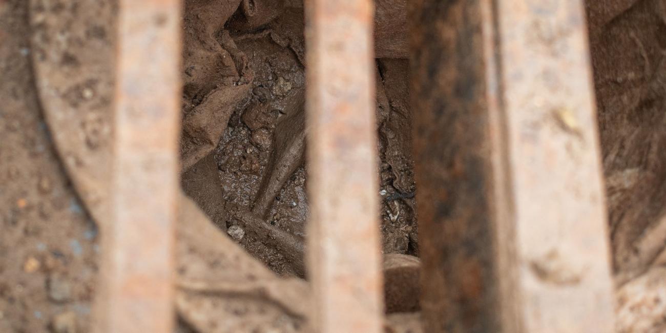 Armadillo Silt Shield catching silt and debris that has fallen through the grate preventing it from entering the water system