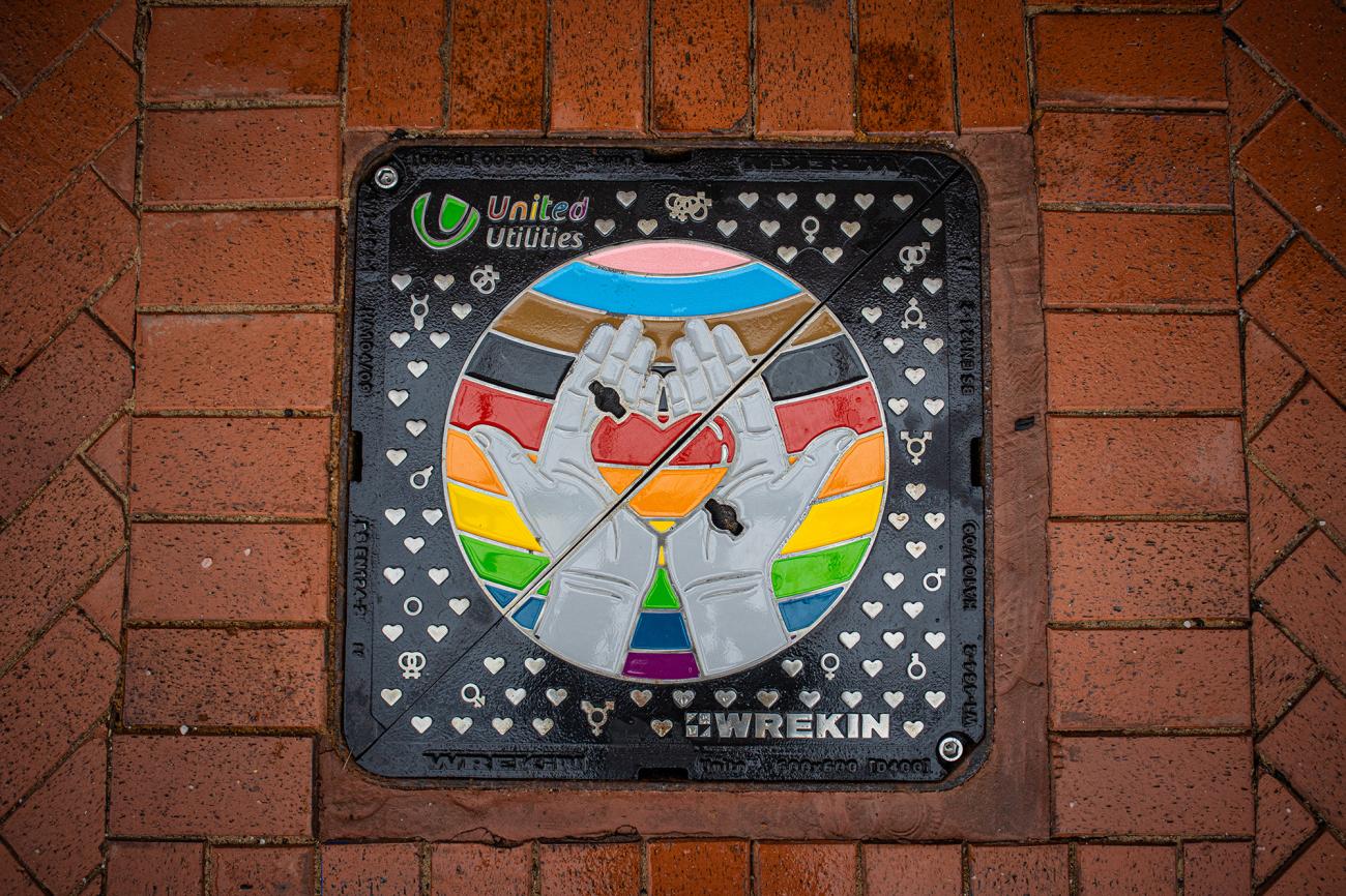 United Utilities logo visible on a bespoke manhole cover manufactured by Wrekin Products