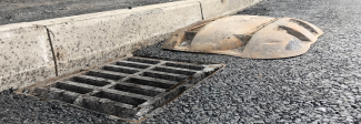 An Armadillo gully grate protector shell showing how it protected the grating beneath