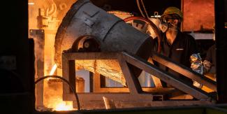 Iron being poured in a furnace