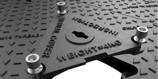 Inspection window on Hercules manhole cover