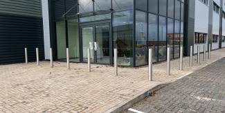 Bespoke steel bollards installed outside office building.jpg