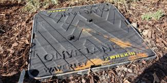 Olive Lane Bespoke manhole cover