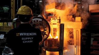 Man operates machinery inside the Wrekin foundry